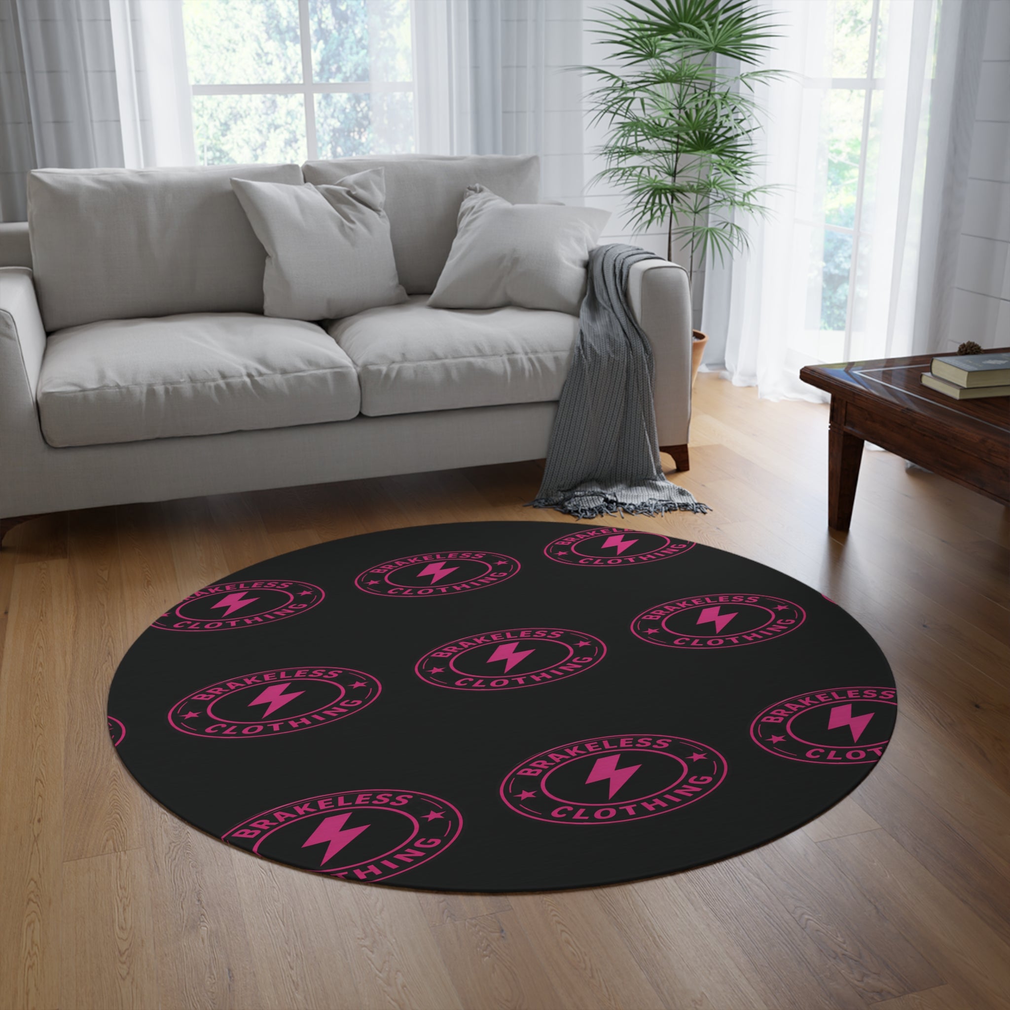 Black Round Rug with Pink 'Brakeless Clothing' Lightning Logo — Retro Punk Floor Mat